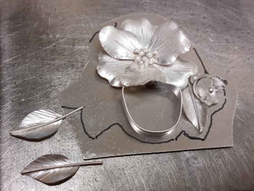 Judy Larson's Three Petal Bud and Layered Embellishment - , Metalwork, Cutting, Cutting Tool, Cutters, Butane Torch, Soldering, Solder, solder elements onto a backplate